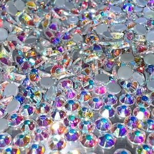 Two Bags of SS10 Crystal AB Hotfix Flatback High Quality Rhinestones equal 48 grams. Plus FREE GIFTS