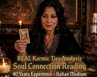 May include: A person with dark hair wearing a black top and a pendant necklace holds a tarot card. The text reads: REAL Karmic Ties Analysis, Soul Connection Reading, 40 Years Experience - Italian Medium. Candles and books are visible in the scene.