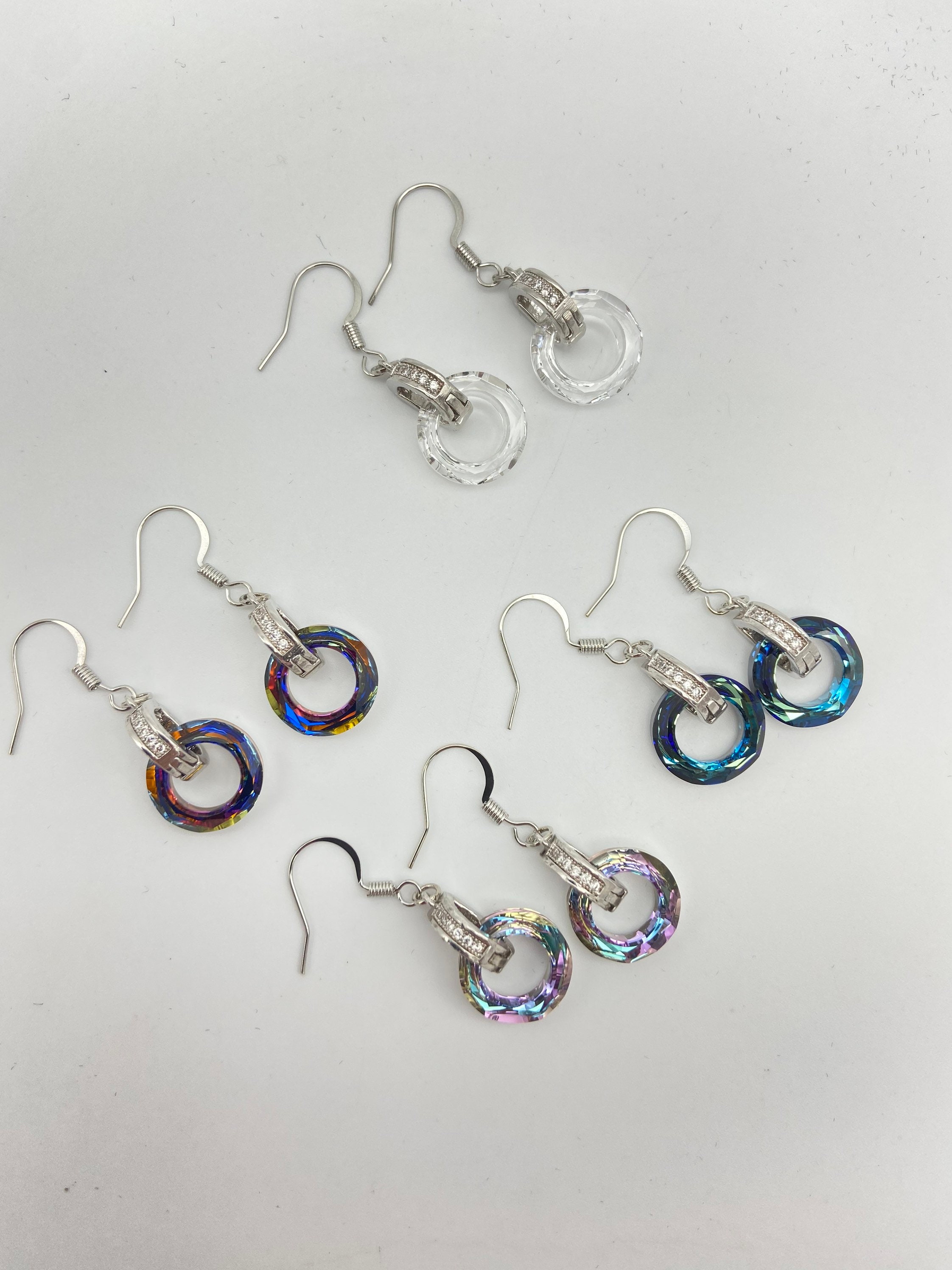 Swarovski cosmic earrings clearance