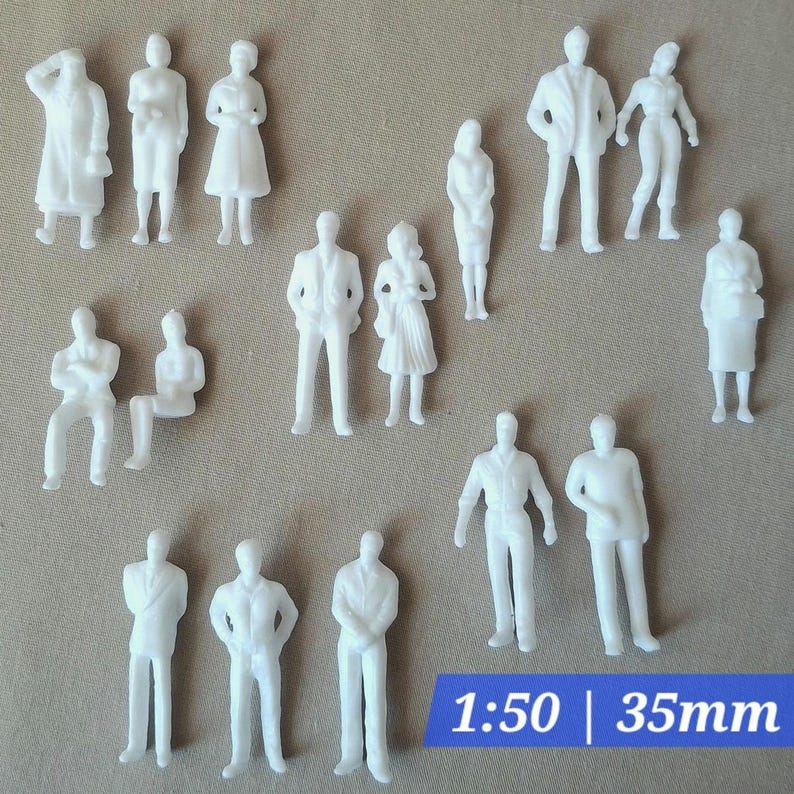 May include: A collection of small, white plastic figures of people in various poses. Some figures are standing, others are sitting. The image includes the text "1:50 | 35mm". These figures are likely used for architectural models or dioramas.