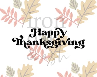 May include: A white background with a black cursive font that says "Happy Thanksgiving" surrounded by fall leaves in shades of pink, green, and yellow.