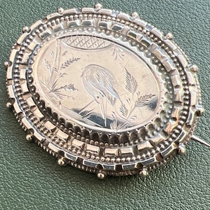 Silver etched heron brooch