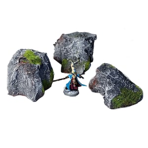 Hand painted tabletop/wargame rock terrain from Mystic Pigeon Gaming. Avalible in different sizes and styles.
