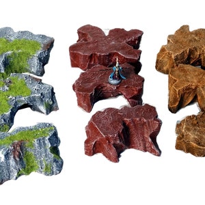 Hand painted tabletop/wargame rock terrain from Mystic Pigeon Gaming. Avalible in different sizes and styles.