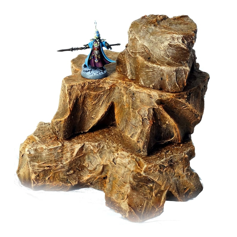 Hand painted tabletop/wargame rock terrain from Mystic Pigeon Gaming. Avalible in different sizes and styles.