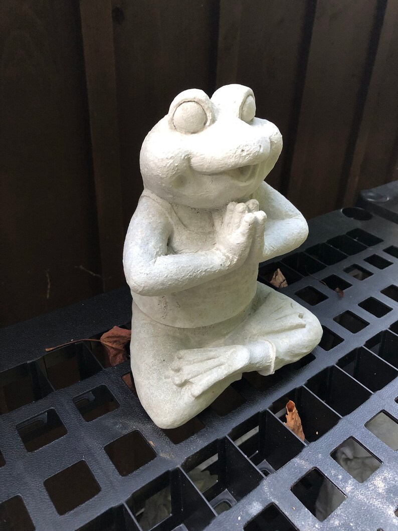 concrete frog statue