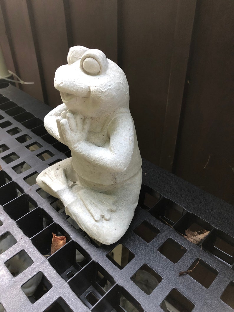 concrete frog statue