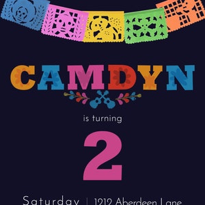May include: A colorful birthday invitation for a child turning two years old. The invitation features a festive design with a banner of colorful paper cutouts, a guitar, and the name "CAMDYN" in large, colorful letters. The text on the invitation reads "is turning 2" and includes the date, time, and location of the party.