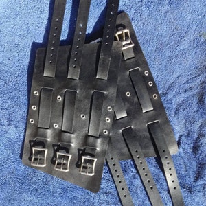 Leather forearm / wrist cuff, extra wide.  6&quot; wide 7 1/2&quot; long at the wrist diameter with eyelets and three 3/4&quot; buckle bands.