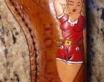 Pistol holster for auto-loader or revolver. Handmade for right handed use. Freehand engraved, monogrammed, and made from scratch.