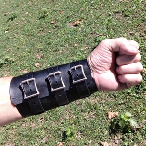 Leather forearm / wrist cuff, extra wide.  6&quot; wide 7 1/2&quot; long at the wrist diameter with three 3/4&quot; buckle bands.