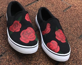 all black vans with roses