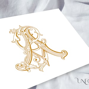 May include: A gold monogram featuring the letters "A" and "A" intertwined in a decorative, ornate font. The letters are surrounded by intricate floral designs.