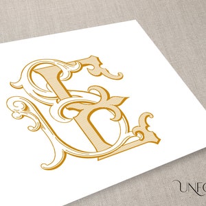 May include: A gold monogram with the letters "S" and "L" intertwined in a decorative, ornate font. The letters are surrounded by intricate flourishes and scrolls.