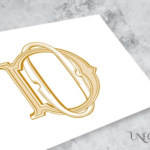May include: A gold-colored monogram initial "D" with a decorative, ornate design. The letter is stylized with a double-layered frame and a curved line.