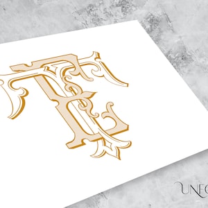 May include: A gold monogram with the letters "FF" in a decorative, ornate font. The letters are intertwined and have a vintage, classic style.