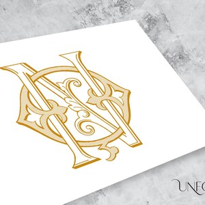 May include: A gold monogram with the letters "N" and "N" intertwined in a decorative, ornate design.