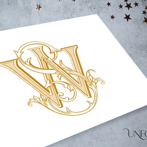 May include: A gold monogram with the letters "W" and "N" intertwined with ornate floral designs.