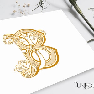 May include: A gold-colored monogram with the letters "S" and "B" intertwined, surrounded by ornate floral designs.