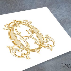 May include: Gold-colored monogram design featuring the intertwined letters "O" and "D" with ornate flourishes and decorative details. The design is printed on a white surface, with the words "UNFOLD MONOGRAMS" in the bottom right corner.