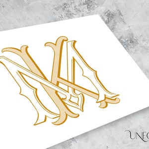 Peut inclure: Un monogramme doré avec les lettres "NA" dans une police de caractères stylisée et ornée. Les lettres sont entrelacées et ont un aspect décoratif et vintage.