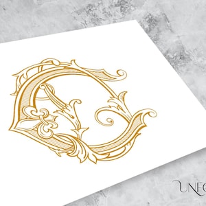 May include: A gold-coloured monogram initial "C" with ornate flourishes and a decorative design. The letter is in a vintage style.