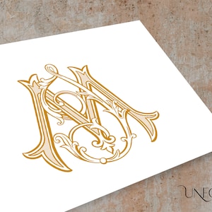 May include: A gold monogram with the letters "M" and "M" intertwined in a decorative, ornate font.