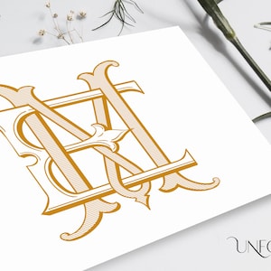 May include: A gold monogram with the letters "BM" intertwined in a decorative, ornate style. The letters are set against a white background.