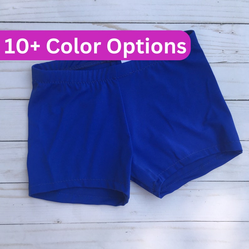 May include: Royal blue spandex shorts with a wide elastic waistband. 10+ Color Options.