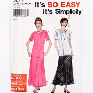 May include: A sewing pattern package with the text "It's SO EASY it's Simplicity". The package features illustrations of two women wearing a pink outfit and a white top with a black polka dot skirt. Instructions are in English, French, and Spanish.