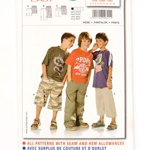 May include: A Burda Easy sewing pattern packet, number 9641, featuring illustrations of pants and shorts. The packet includes images of three boys wearing different styles of pants and shorts. The text on the packet includes "HOSE - PANTALON - PANTS".