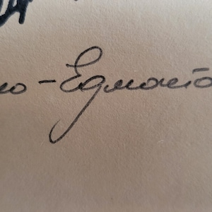 May include: Close-up of handwritten text in black ink on a beige background. The text includes the words "Kyпaлo - Eдмостой" and the number "'81". The handwriting is cursive.