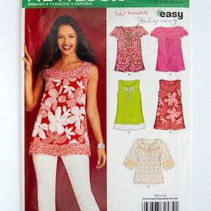 Pode incluir: Um padrão de costura New Look com uma mulher vestindo um top floral vermelho e branco e calças brancas. O padrão inclui ilustrações de vários tops, com o texto "NEW LOOK" no topo.