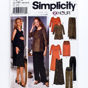 May include: Simplicity sewing pattern 9516 for maternity wear. The pattern offers options for a dress, top, skirt, and trousers. The cover displays illustrations of the finished garments in various colours and patterns, including leopard print.