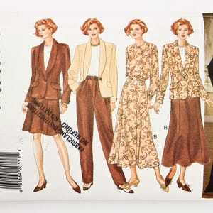 May include: A vintage Butterick sewing pattern envelope showing illustrations of women's suits and dresses. The designs include a skirt suit, trousers suit, and a dress with a floral pattern. The envelope is labelled "JH Collectibles" and includes size information.
