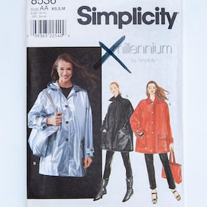 May include: Simplicity sewing pattern 8536 for a hooded jacket in size AA, XS, S, M. The envelope features illustrations of a metallic silver jacket, a black jacket, and a red jacket, each with a collar, front buttons, and large patch pockets.