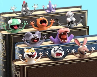 May include: A collection of whimsical animal-shaped bookmarks, each with a unique expression and pose. The bookmarks are designed to sit on top of the pages of a book, adding a playful touch to reading. The animals include a frog, koala, panda, and more.