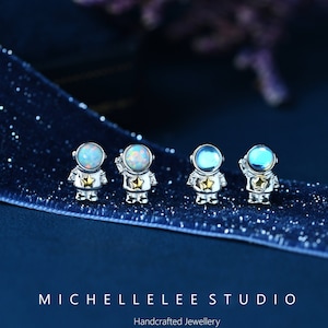 Space Astronaut Stud Earrings in Sterling Silver, Mismatched Astronaut Earrings with White Opal and Simulated Moonstone Helmet