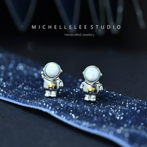 Space Astronaut Stud Earrings in Sterling Silver, Mismatched Astronaut Earrings with White Opal and Simulated Moonstone Helmet