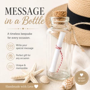 May include: A clear glass bottle with a cork stopper, containing a rolled-up paper tied with red and white twine. The bottle is labeled "MESSAGE in a Bottle" and includes the text "Handmade with Love". A starfish and seashells are in the foreground.