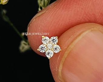 14K gulddiamantblomörhänge: Näs-, tragus- och snäckpiercing