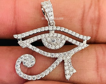 Colgante de ojo de Horus en oro de 14 quilates: auténtica joya espiritual con diamantes.