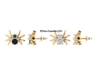 May include: A pair of gold spider earrings with black and white gemstones. The earrings are shown from the front, side, and back. The text "@StarJewelleryIN" is visible in the image.