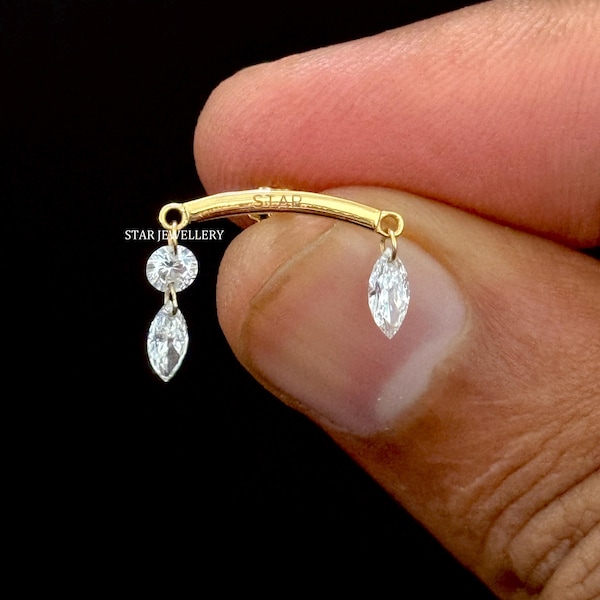 Pendiente de oro de 14 quilates con diamantes: Marquesa y redondo flotante