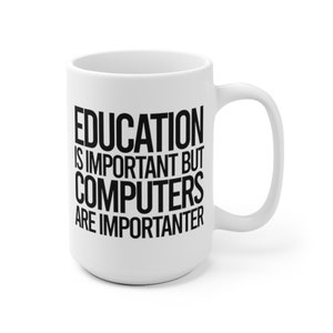 May include: White ceramic mug with a large handle. The mug features the text "EDUCATION IS IMPORTANT BUT COMPUTERS ARE IMPORTANTER" in bold black letters. A humorous gift for computer enthusiasts.