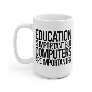 May include: White ceramic mug with a large handle. The mug features the black text: "EDUCATION IS IMPORTANT BUT COMPUTERS ARE IMPORTER". The mug is designed for hot beverages and is suitable for home or office use.