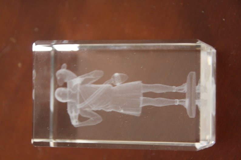Solid glass press paper 8x5x5 cm with 3D engraved shepherd with sheep over the shoulders