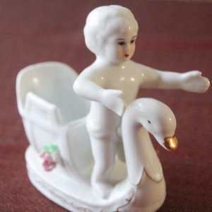 Old porcelain figurine boy with swan 13 cm / 5 inch Early 20th century
