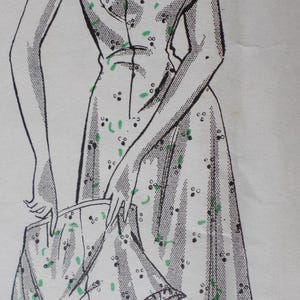 May include: A black and white line drawing of a woman wearing a white dress with a green and black pattern. The dress has a lace trim and a fitted bodice.