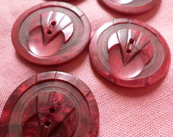 set of 5 Vintage  red plastic buttons with raised detail 1.1/8" dia